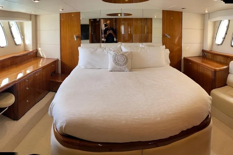 Slide: The Image of Luxurious bedroom interior of 2009 Sunseeker Predator 62 yacht with elegant wood finishes. - 25