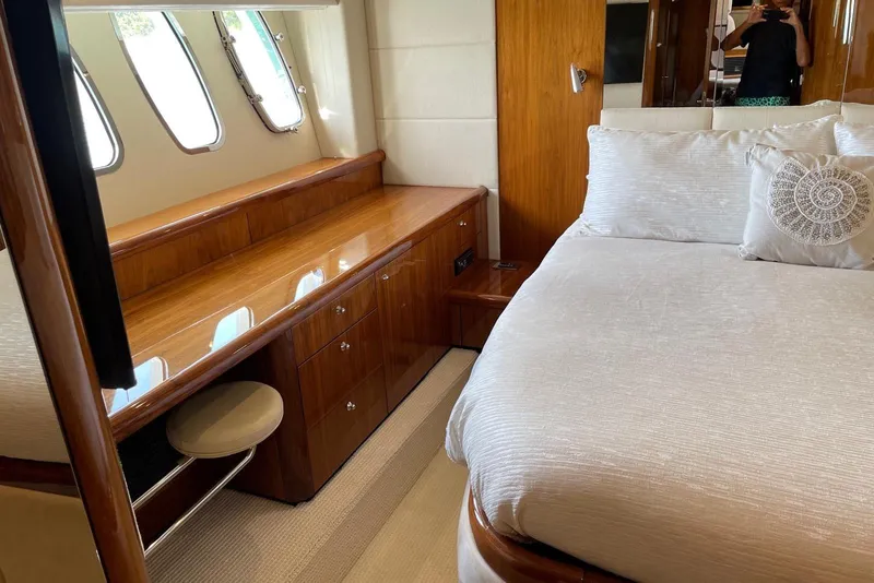 Slide: The Image of Luxurious bedroom interior of 2009 Sunseeker Predator 62 yacht with elegant wood finishes. - 27