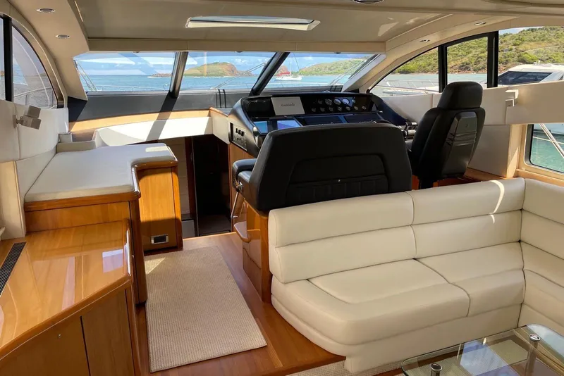 Slide: The Image of Luxurious interior of a 2009 Sunseeker Predator 62 yacht with leather seating and panoramic views. - 29