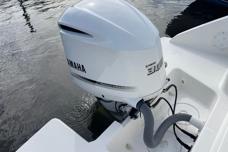Slide: The Image of Yamaha 300 outboard motor on 2020 Pursuit DC 235 Dual Console boat. - 40