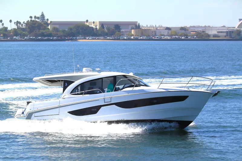 Slide: The Image of 2022 Beneteau Antares 11 cruising on open water, showcasing sleek design and performance. - 0