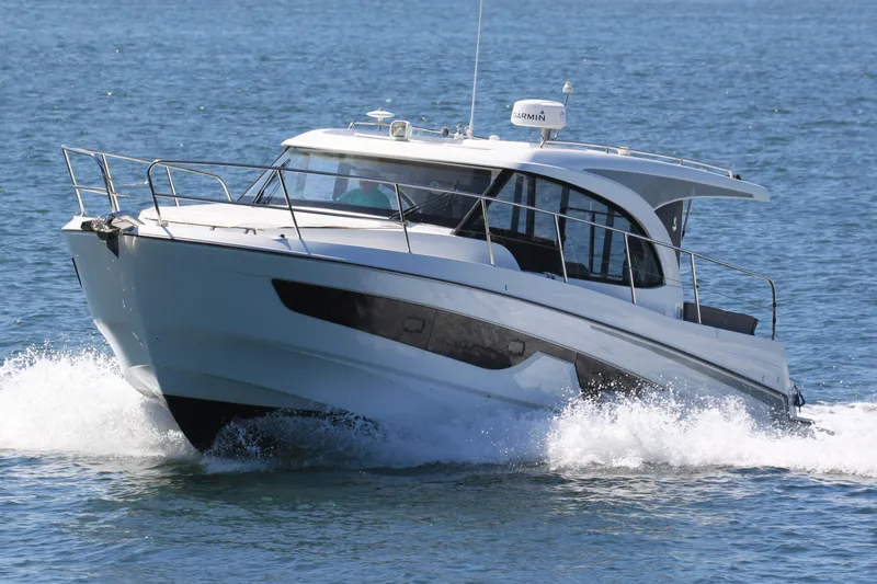 Slide: The Image of 2022 Beneteau Antares 11 cruising on open water. - 3