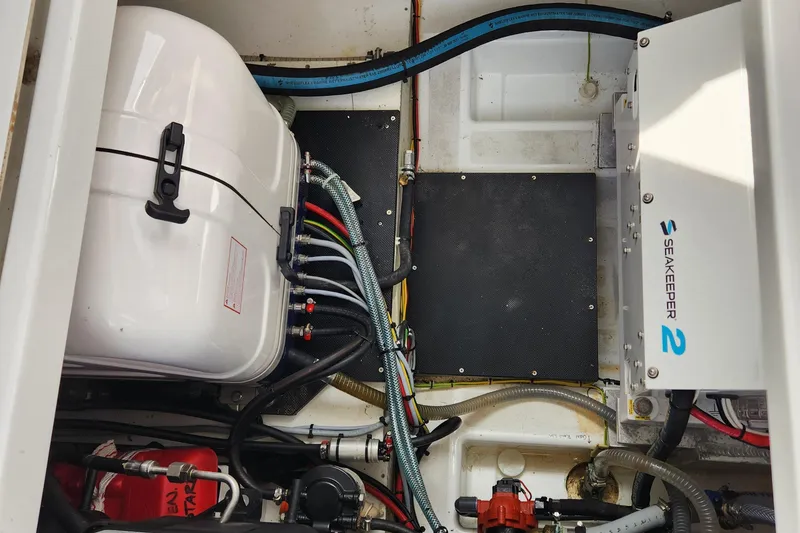 Slide: The Image of Engine compartment of 2022 Beneteau Antares 11 with Seakeeper 2 stabilization system. - 31