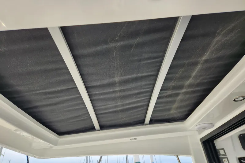 Slide: The Image of Roof interior of 2022 Beneteau Antares 11 boat, featuring sleek design and modern materials. - 38