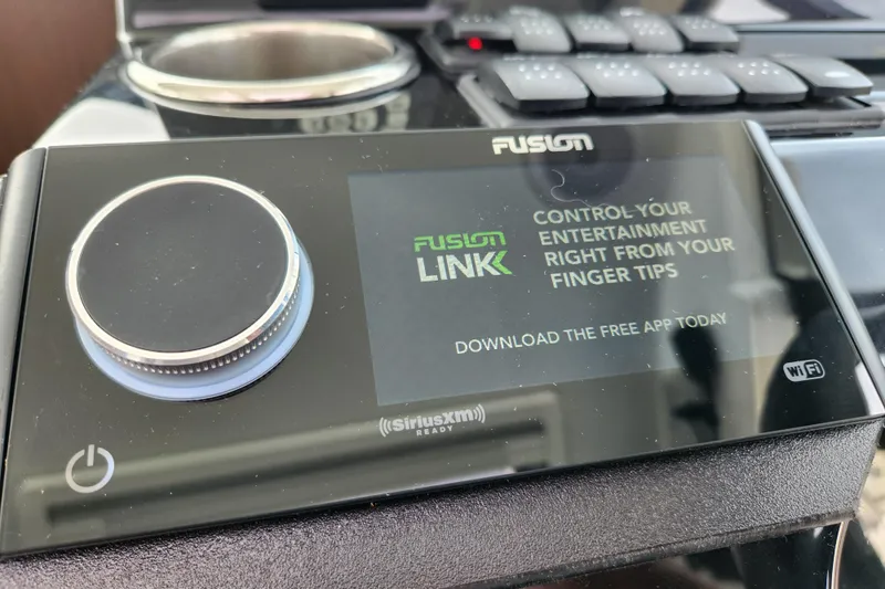 Slide: The Image of Fusion Link control panel on 2022 Beneteau Antares 11 boat dashboard. - 43
