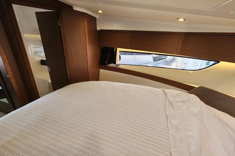 Slide: The Image of Luxurious cabin interior of 2022 Beneteau Antares 11 yacht with modern wood finish. - 45