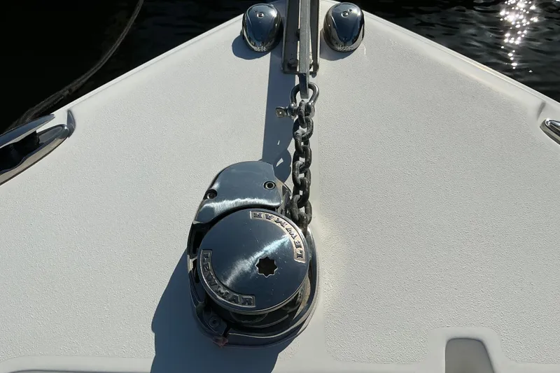 Slide: The Image of Bow of 2019 Sea Hunt Ultra 225 with anchor chain and winch. - 21
