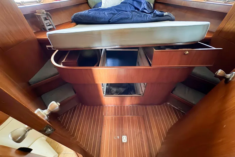 Slide: The Image of Cockpit of a 2000 Horizon E56 yacht overlooking the harbor. - 23