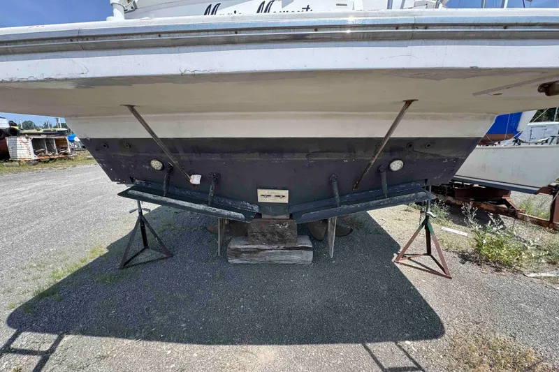 Slide: The Image of Side view of a 2000 Horizon E56 yacht in a boatyard. - 5