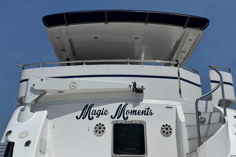 Slide: The Image of 2000 Horizon E56 yacht on dry dock under clear blue sky. - 6