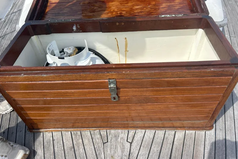 Slide: The Image of Wooden storage box on Hans Christian 43 yacht deck, containing a propane tank. - 30