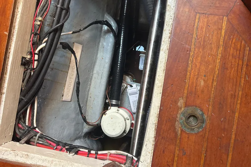 Slide: The Image of Electrical wiring and components inside a 1980 Hans Christian 43 sailboat. - 46