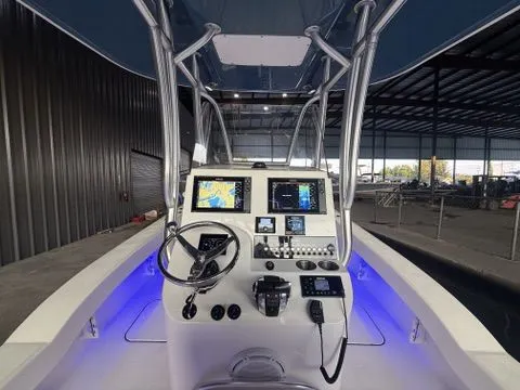 Slide: The Image of 2009 G3 1860 CC aluminum boat parked outdoors on a sunny day. - 11