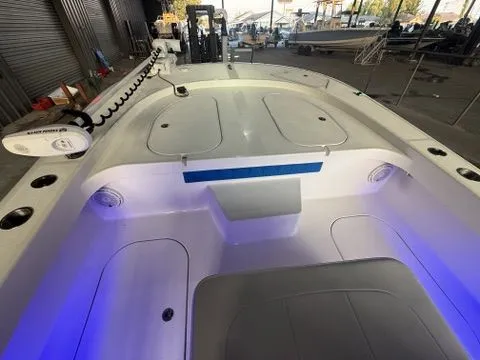 Slide: The Image of 2009 G3 1860 CC boat on a lot with forklift nearby. - 7