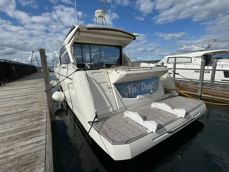 Slide: The Image of 2016 Absolute Sport Yacht docked at marina under cloudy sky. - 17