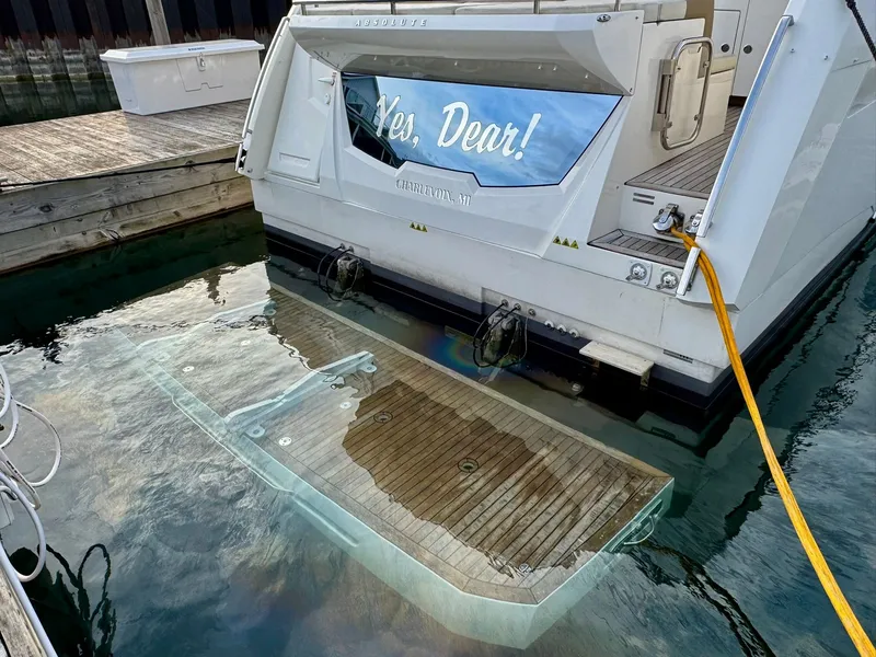 Slide: The Image of 2016 Absolute Sport Yacht with submerged swim platform at dock. - 22