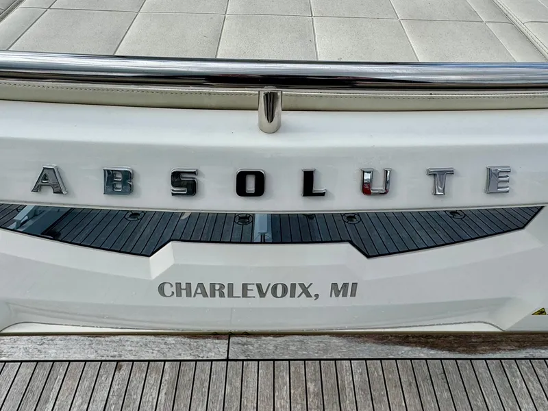 Slide: The Image of 2016 Absolute Sport Yacht stern with "Charlevoix, MI" inscription. - 24