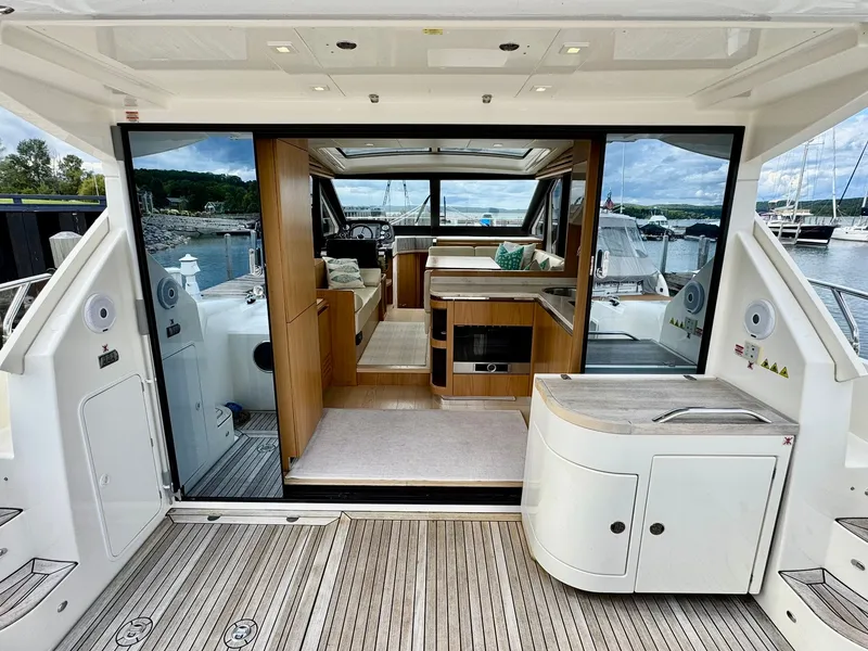 Slide: The Image of Luxurious 2016 Absolute Sport Yacht interior with modern design and scenic marina view. - 38