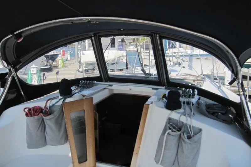 Slide: The Image of Cockpit view of a 2004 Catalina 350 MkII sailboat at a marina. - 36
