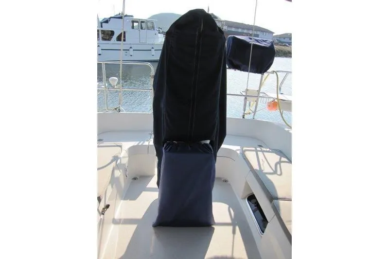 Slide: The Image of 2004 Catalina 350 MkII cockpit with covered helm and seating area. - 49