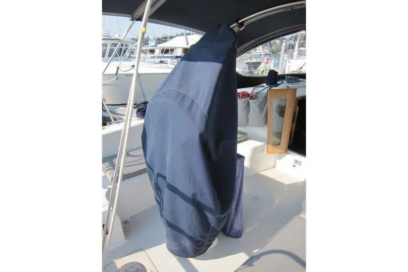 Slide: The Image of Covered helm station on a 2004 Catalina 350 MkII sailboat. - 50