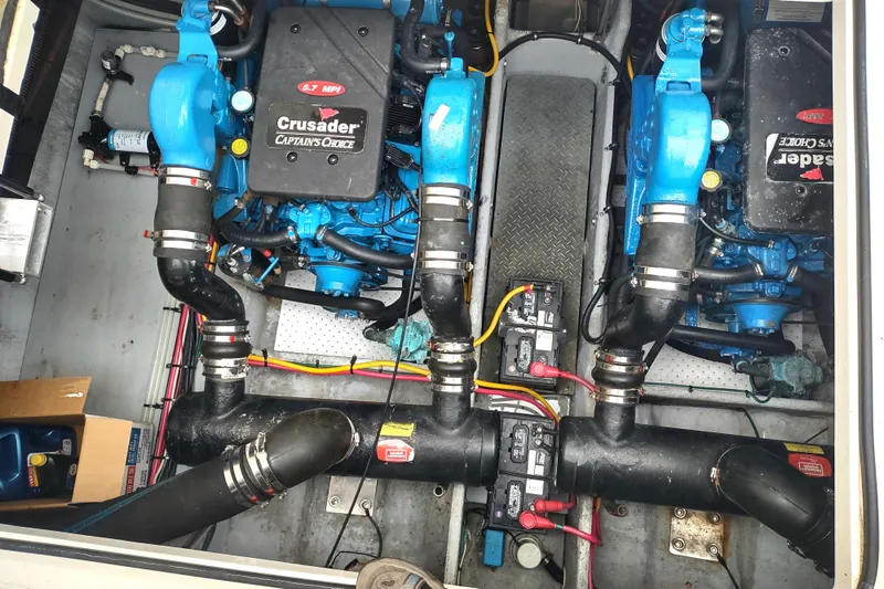 Slide: The Image of Engine compartment of a 2003 Silverton 330 Sport Bridge with Crusader engines. - 50