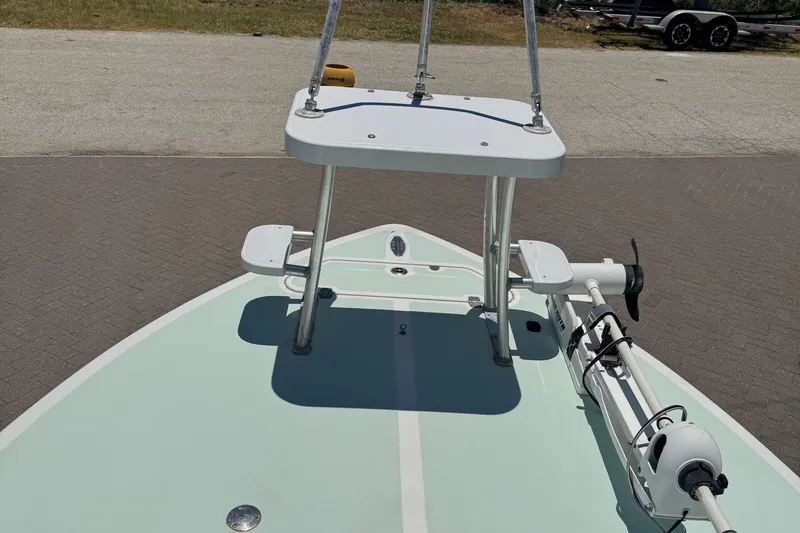 Slide: The Image of 2007 NewWater Ibis boat deck with trolling motor and elevated platform. - 13