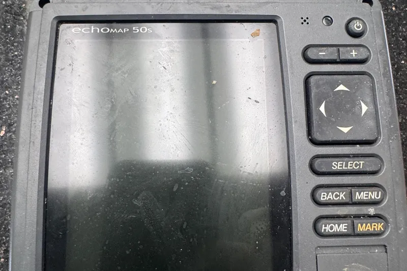 Slide: The Image of Close-up of a Garmin echoMAP 50s marine GPS device with buttons and screen. - 15
