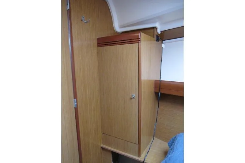 Slide: The Image of Interior cabin of 2008 Jeanneau Sun Odyssey 39i sailboat with wooden cabinetry. - 21