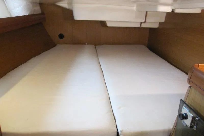Slide: The Image of Interior cabin of 2008 Jeanneau Sun Odyssey 39i sailboat with twin beds. - 24