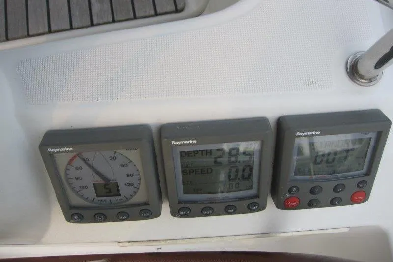 Slide: The Image of Raymarine instruments on 2008 Jeanneau Sun Odyssey 39i, displaying depth, speed, and wind data. - 39