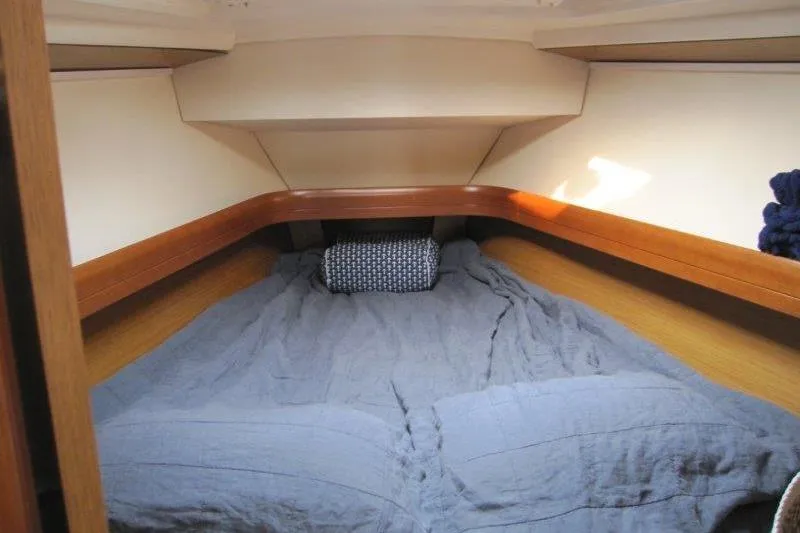 Slide: The Image of Cozy cabin interior of 2008 Jeanneau Sun Odyssey 39i sailboat with comfortable bedding. - 9