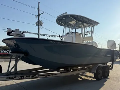 Slide: The Image of 2020 Tideline 235 Hybrid boat on trailer, side view, outdoors, clear sky. - 15