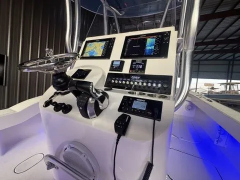Slide: The Image of 2020 Tideline 235 Hybrid boat console with advanced navigation and control systems. - 20