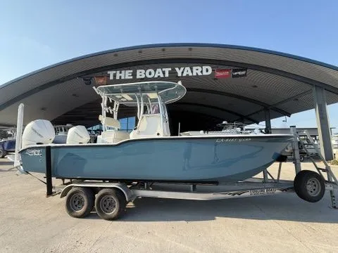 Slide: The Image of 2020 Tideline 235 Hybrid boat on trailer at dealership. - 24