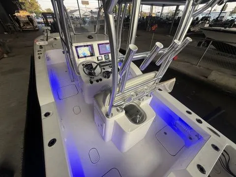 Slide: The Image of 2020 Tideline 235 Hybrid boat interior with illuminated controls and seating. - 27