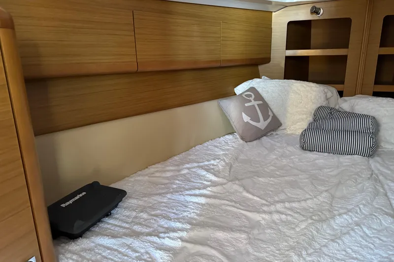 Slide: The Image of Cozy cabin interior of 2009 Jeanneau Sun Odyssey 44i with nautical-themed decor. - 24