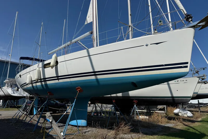 Slide: The Image of 2009 Jeanneau Sun Odyssey 44i sailboat on stands in a boatyard. - 4