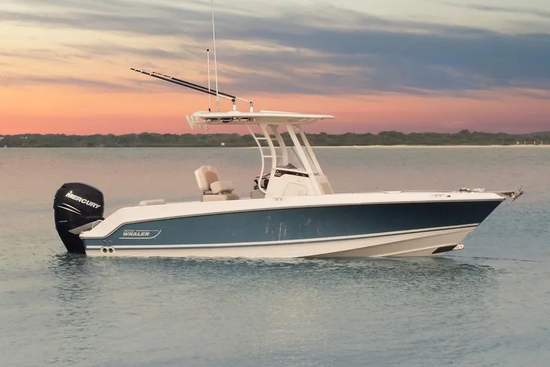 Slide: The Image of Manufacturer Provided Image: 2025 Boston Whaler 230 Outrage boat on calm water at sunset. - 20