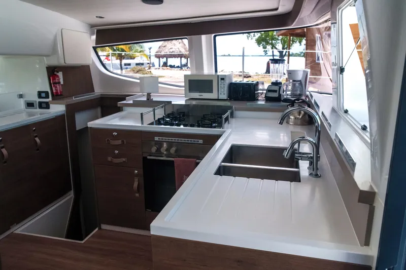 Slide: The Image of Modern kitchen interior on 2023 Bali 4.4 yacht, featuring appliances and sleek design. - 21