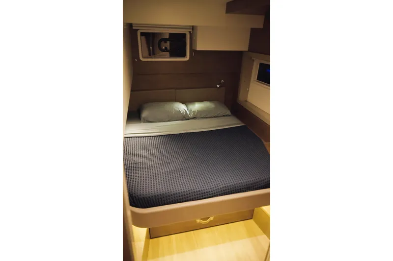 Slide: The Image of Cozy cabin bedroom in 2023 Bali 4.4 yacht with modern bedding. - 28