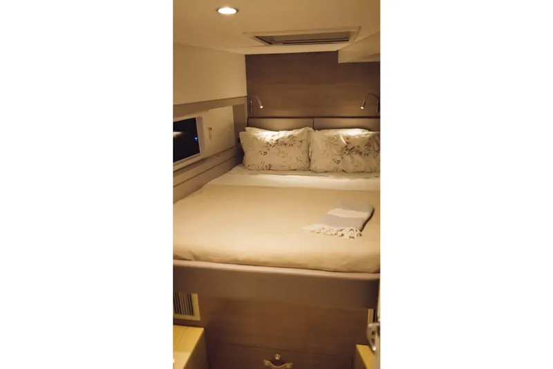 Slide: The Image of Cozy bedroom in 2023 Bali 4.4 model yacht with elegant bedding and ambient lighting. - 32