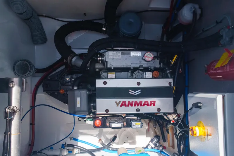 Slide: The Image of Engine compartment of a 2023 Bali 4.4 yacht featuring a Yanmar engine. - 41