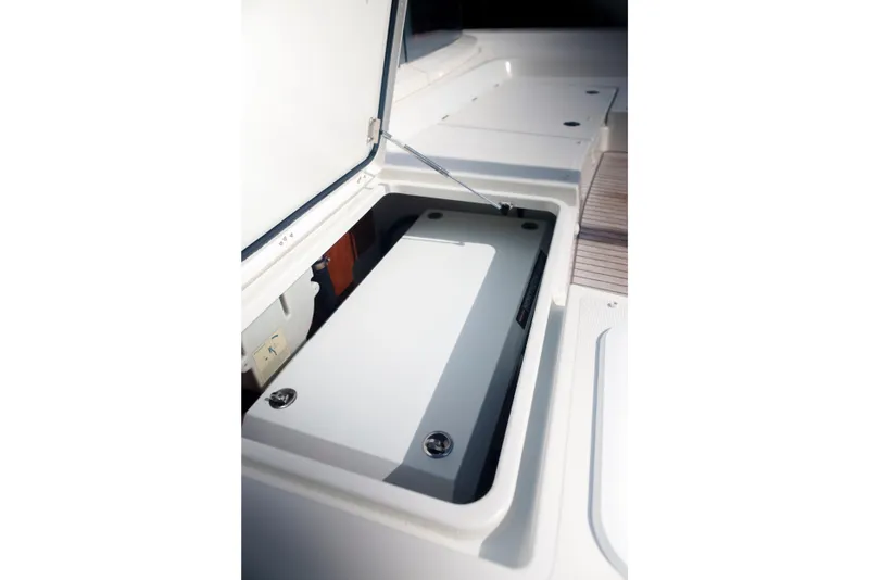 Slide: The Image of Open storage compartment on 2023 Bali 4.4 yacht deck. - 43