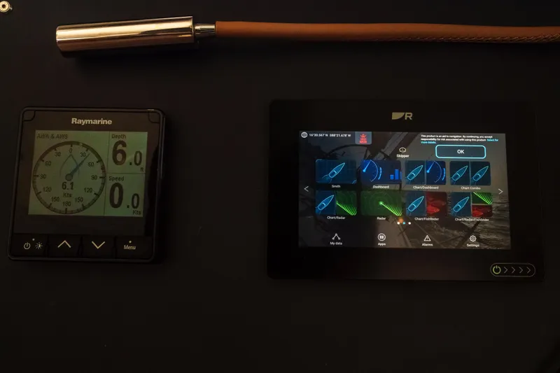 Slide: The Image of Control panel of 2023 Bali 4.4 yacht with Raymarine display and navigation screen. - 45