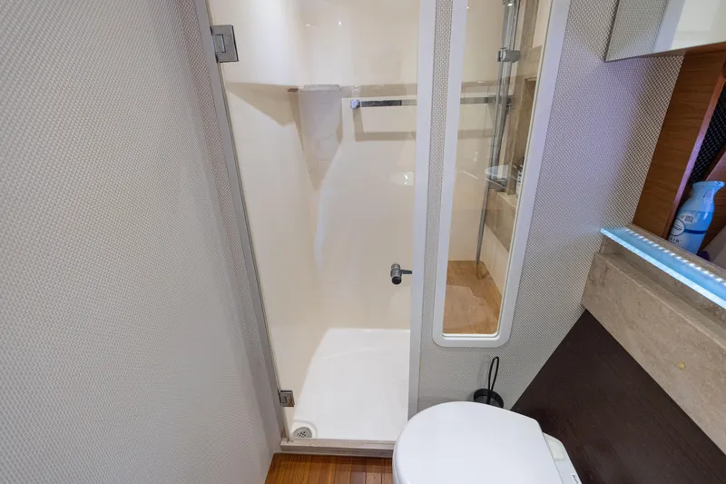 Slide: The Image of Bathroom interior of 2015 Tiara Yachts C44 Coupe with shower and toilet. - 29
