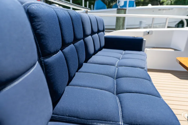 Slide: The Image of Luxurious blue seating on 2015 Tiara Yachts C44 Coupe deck. - 42