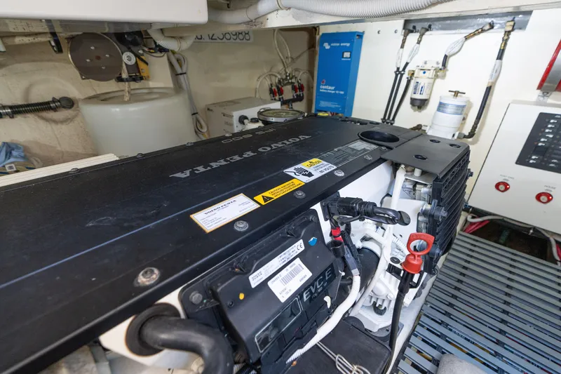 Slide: The Image of Engine room of 2015 Tiara Yachts C44 Coupe featuring Volvo Penta engine. - 54