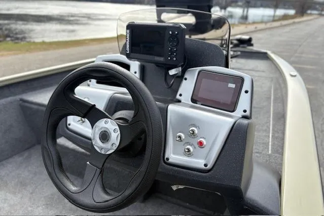 Slide: The Image of Steering console of 2026 Tracker Pro Team 190 boat with modern navigation equipment. - 17