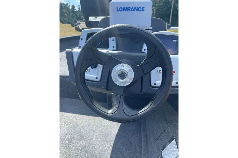Slide: The Image of Steering wheel of 2026 Tracker Pro Team 175 Crappie Edition boat with Lowrance system. - 6
